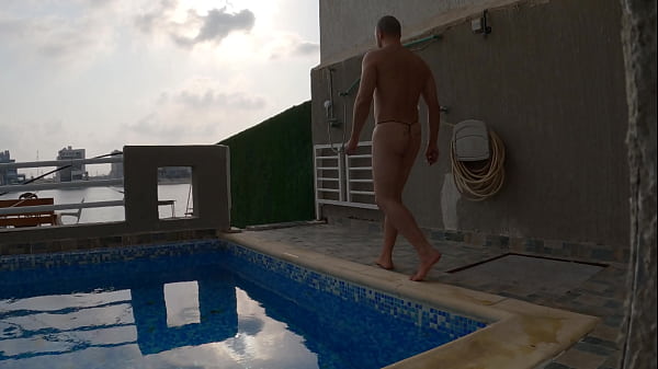 Kuwaiti shorts thong guy shows ass by pool